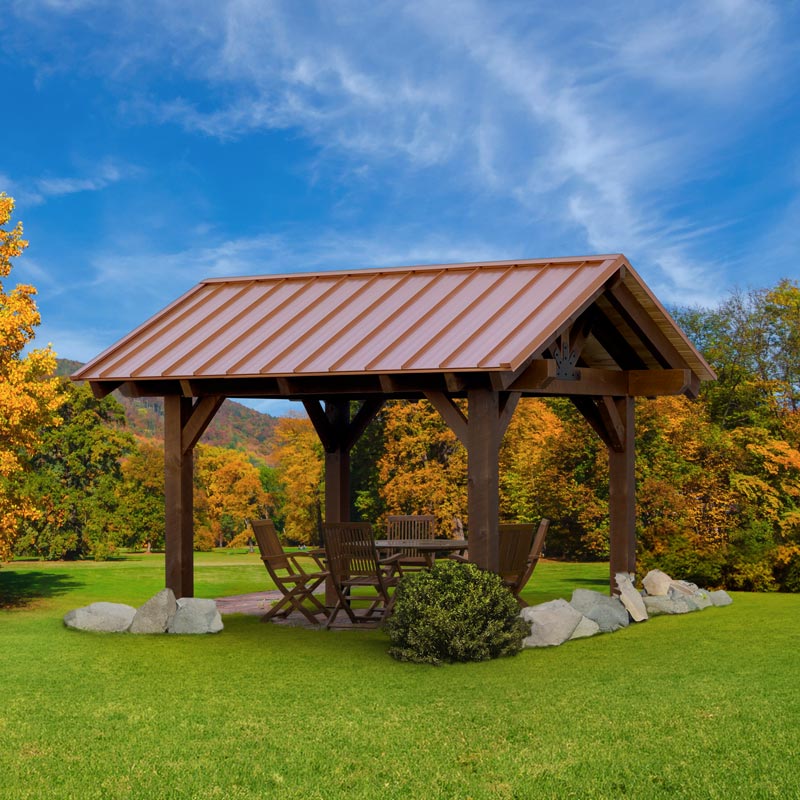 Kauffman Timber Pavilion with copper roof and tale and chairs inside